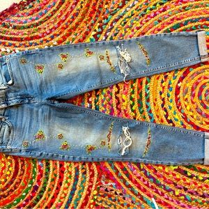 Lucky brand raw hem embroidered jeans.
